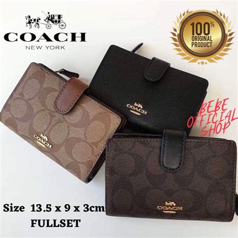 harga dompet coach.